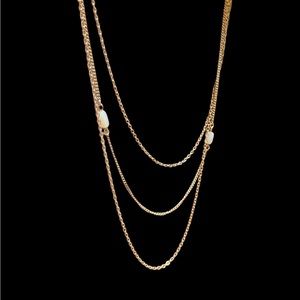 3 chain gold necklace with 2 white moonstones.